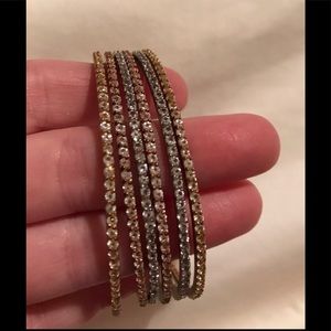 Sparkly rhinestone bangle bracelets.